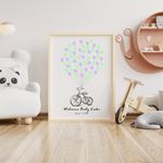Toy-themed baby shower guest book featuring colorful tricycle fingerprint art and space for guest signatures.
