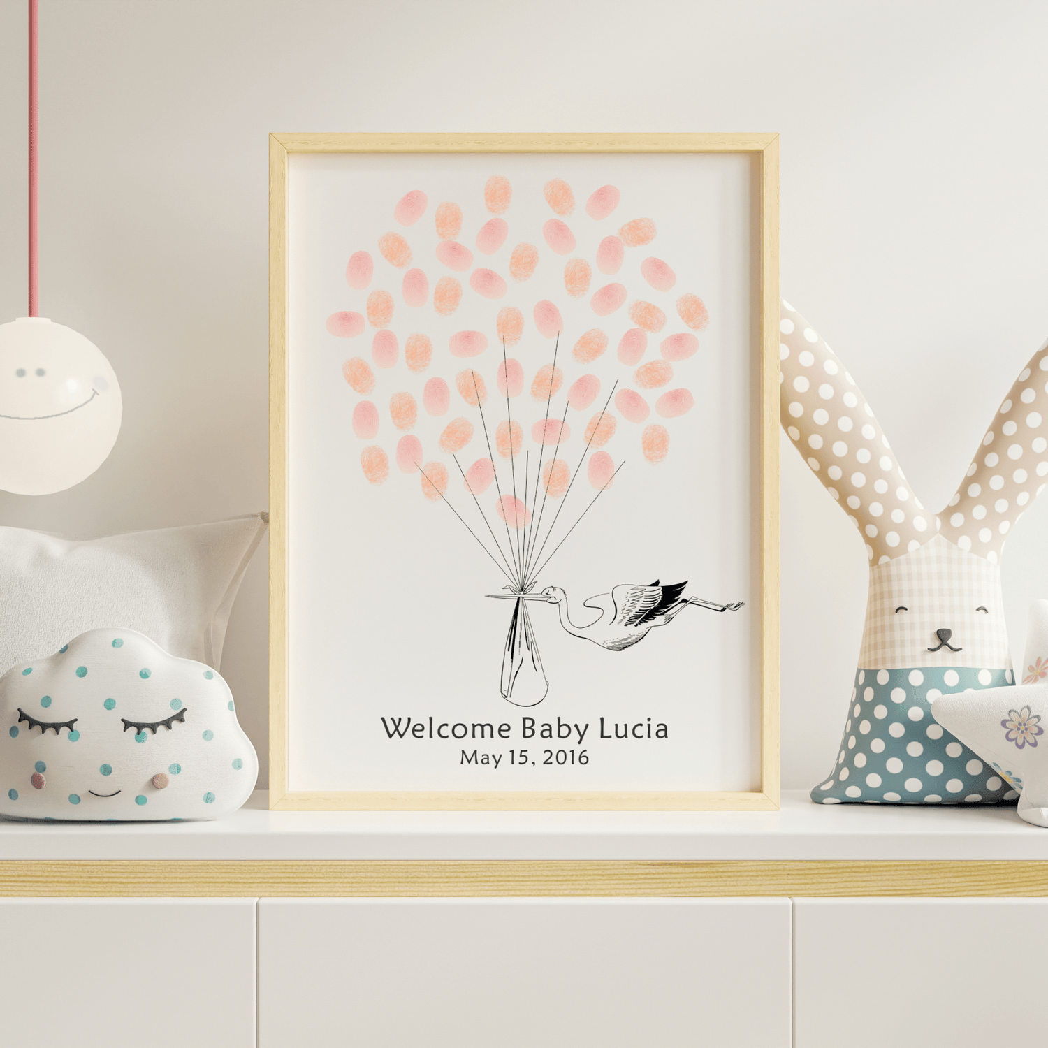 Stork Baby Shower Guest Book featuring colorful thumbprint balloon keepsake design