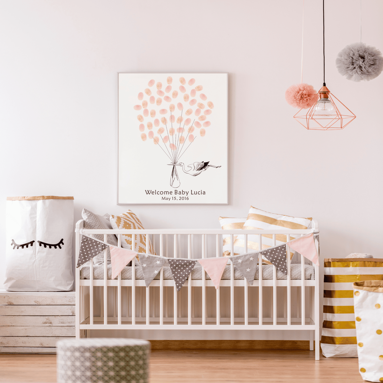 Gender neutral fingerprint balloon guest book featuring a stork carrying a baby illustration with guests’ thumbprints as balloons