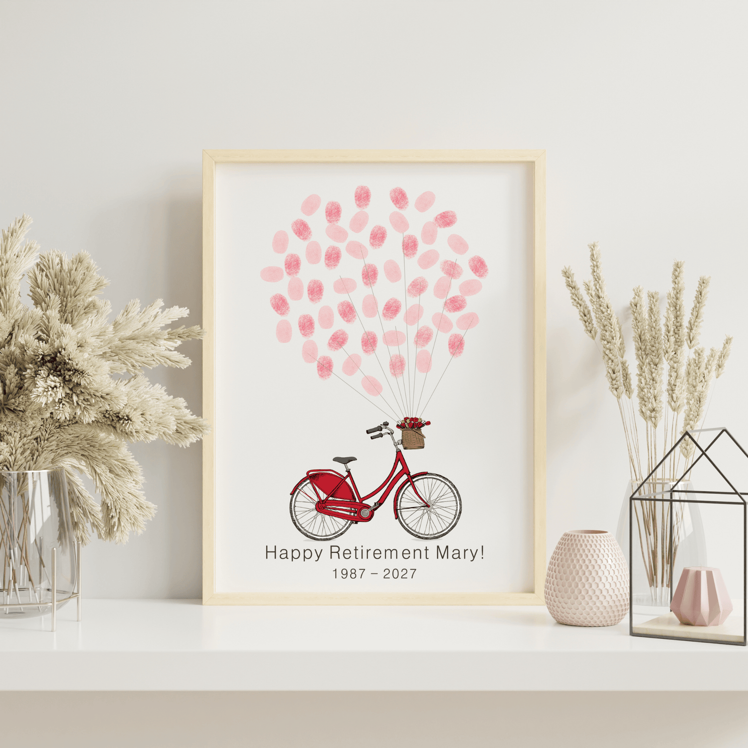 Unique retirement guest book featuring red bike and colorful thumbprint balloons