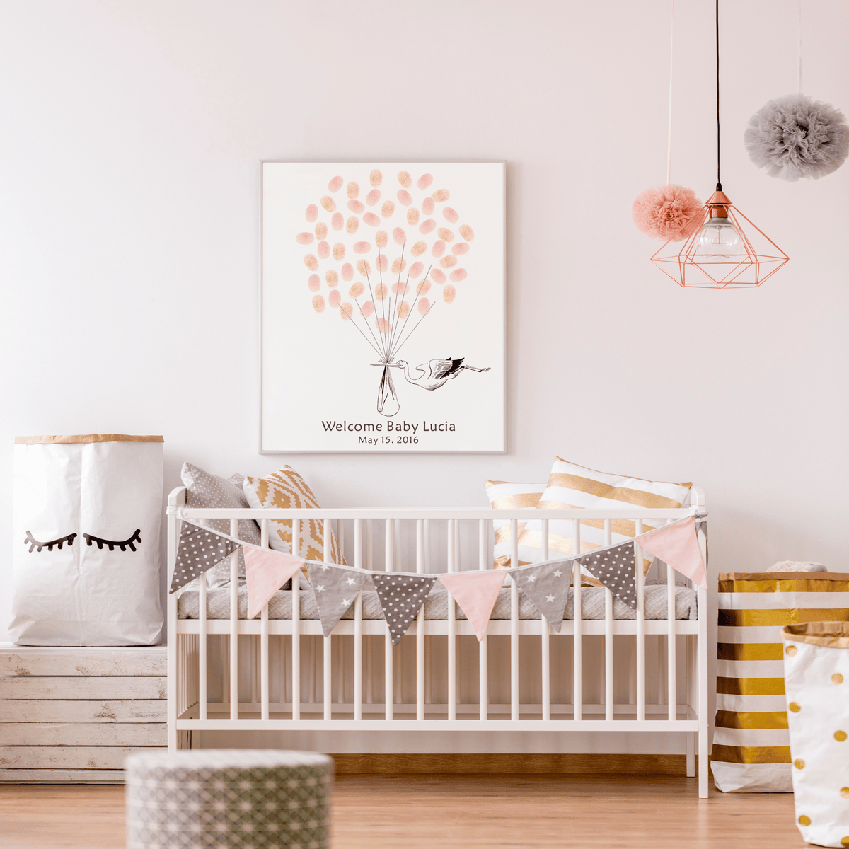 Gender neutral fingerprint balloon guest book featuring a stork carrying a baby illustration with guests’ thumbprints as balloons