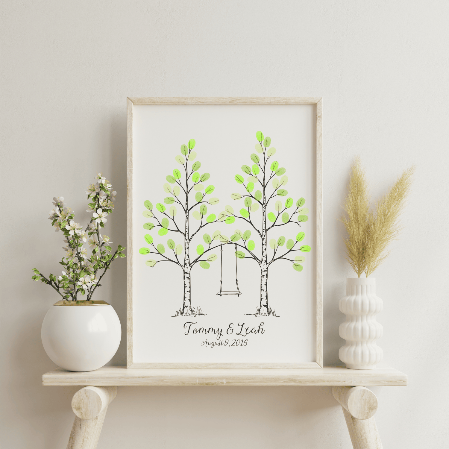 Double aspen tree fingerprint guest book with swing, personalized with couple’s names and wedding date.