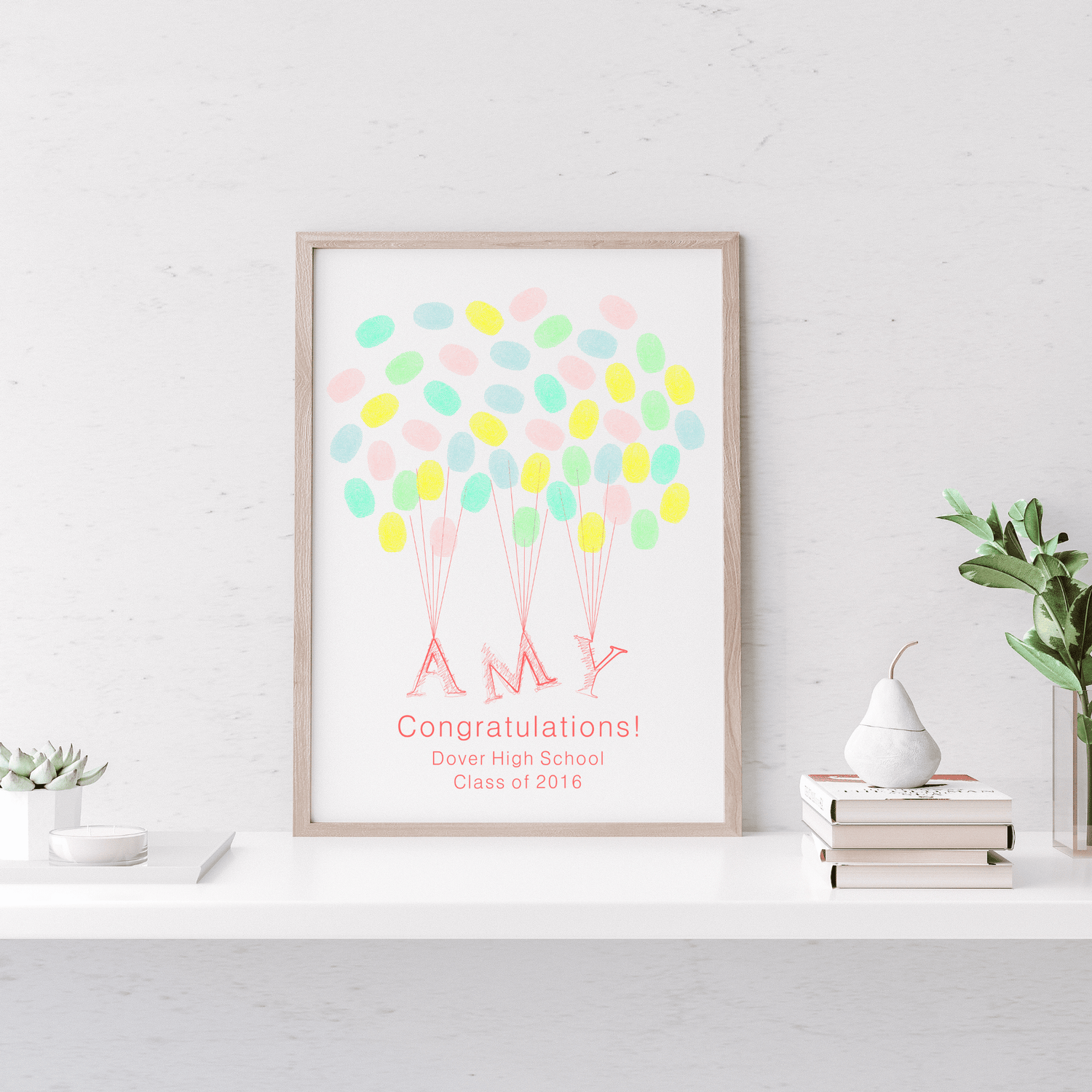 Adorable guest book featuring baby's name floating with fingerprint balloons, a sweet keepsake for baby showers or baptisms