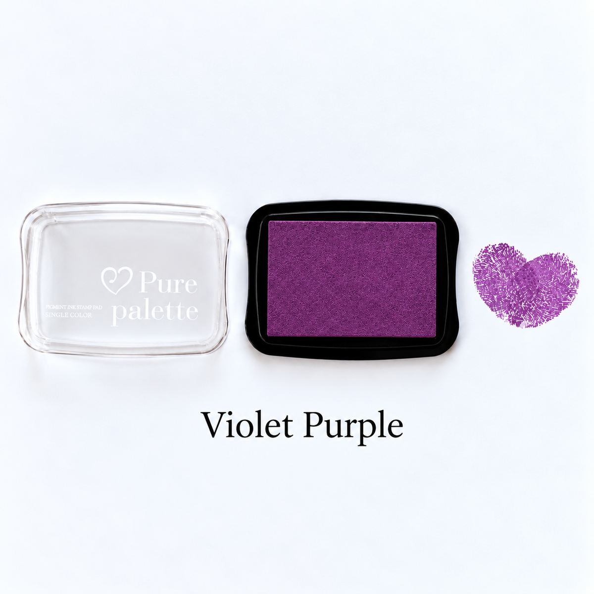 Violet purple fingerprint guest book ink pad beside a heart-shaped sample print